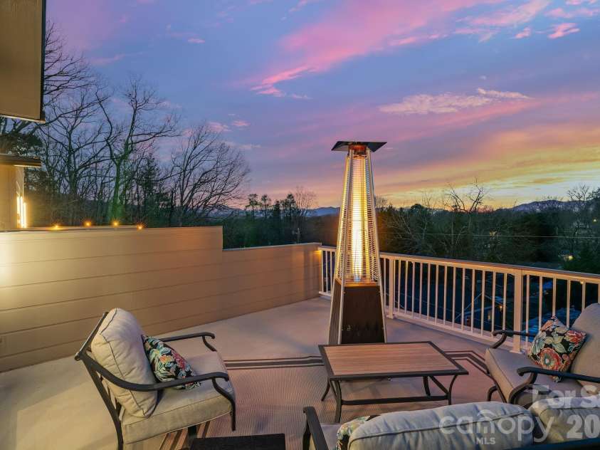 9 Gudger Road, Asheville, NC 28806.  MLS# CAR4406363, YatesRealty ID 15085. Enchanting Sunsets from the Rooftop Terrace