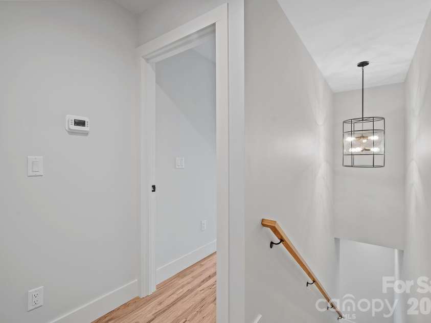 9 Gudger Road, Asheville, NC 28806.  MLS# CAR4406363, YatesRealty ID 15085. Premium Light Fixtures Throughout
