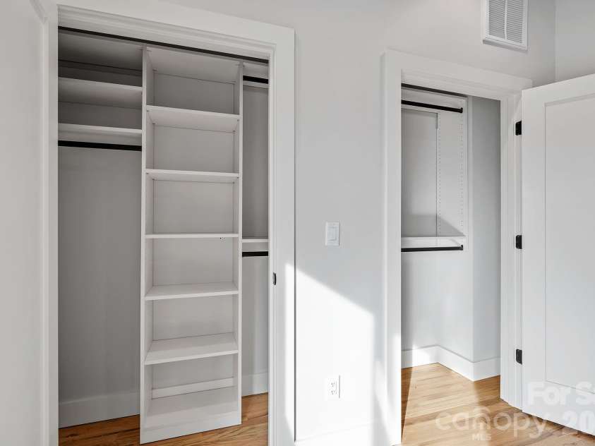 9 Gudger Road, Asheville, NC 28806.  MLS# CAR4406363, YatesRealty ID 15085. Professional Custom Closet in the Primary Suite