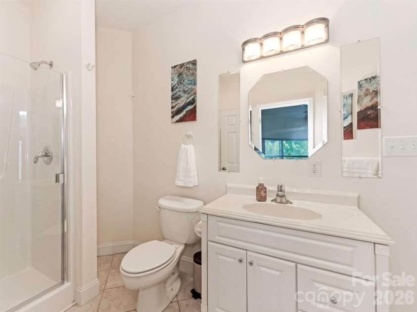 9535 Potter Road, Matthews, NC 28104.  MLS# CAR4365196, YatesRealty ID 15087. Guest Bathroom 