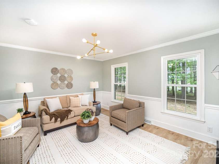 328 Earl Griffin Road, Monroe, NC 28112.  MLS# CAR4251037, YatesRealty ID 15093. 1st Floor Flex Room: Dining Room, Office, Playroom, Living Room