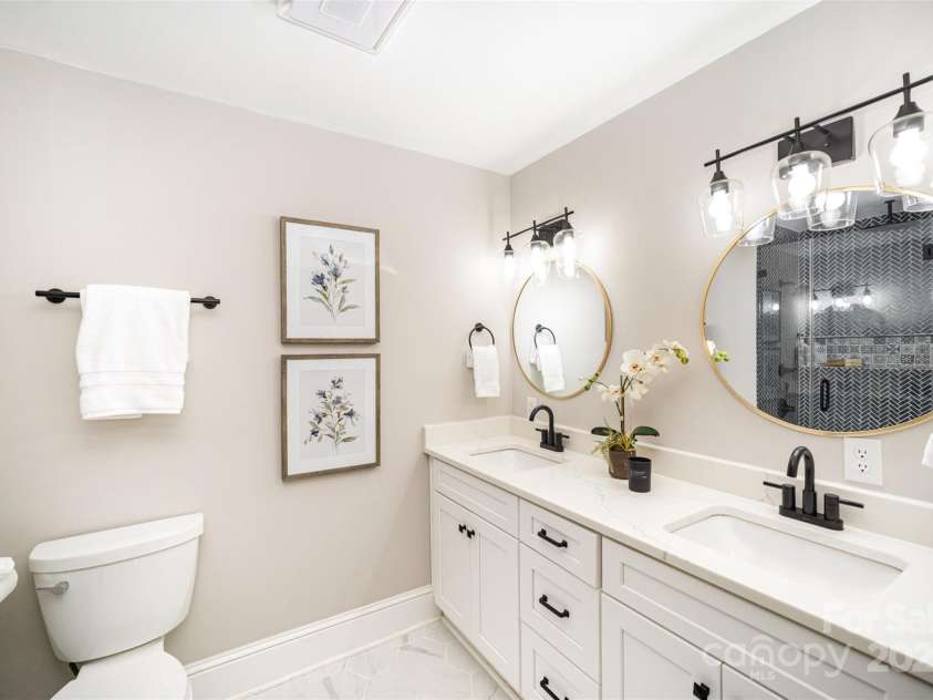 328 Earl Griffin Road, Monroe, NC 28112.  MLS# CAR4251037, YatesRealty ID 15093. Primary En-Suite Dual Vanity Bathroom