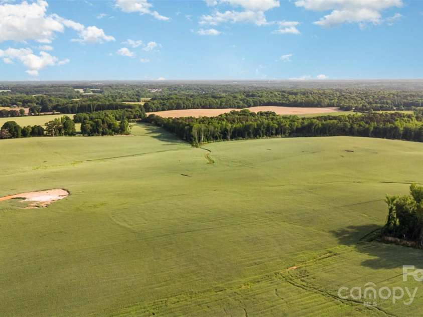 328 Earl Griffin Road, Monroe, NC 28112.  MLS# CAR4251037, YatesRealty ID 15093. View across the street