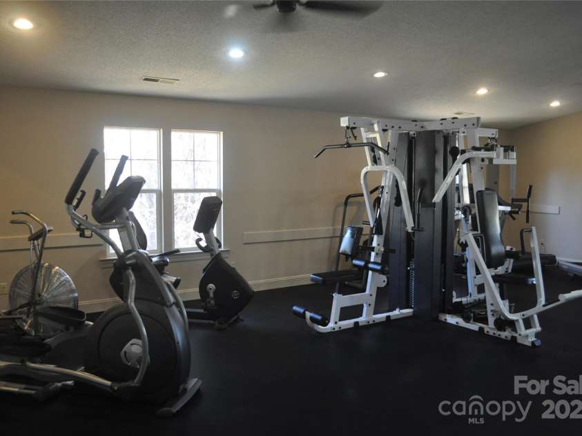 51 Barn Owl Way, Hendersonville, NC 28792.  MLS# CAR4328373, YatesRealty ID 1510. Fitness room