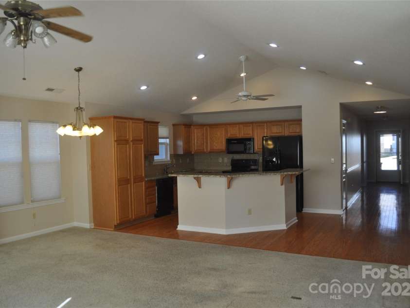 51 Barn Owl Way, Hendersonville, NC 28792.  MLS# CAR4328373, YatesRealty ID 1510. Great Room Corner view back toward Kitchen