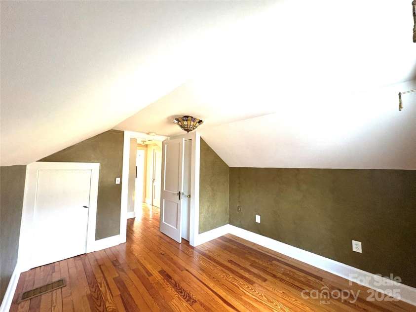 114 Broadway Avenue, Tryon, NC 28782.  MLS# CAR4322856, YatesRealty ID 15101. Third bedroom with two closets.