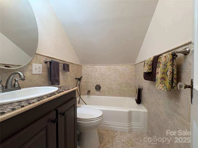 114 Broadway Avenue, Tryon, NC 28782.  MLS# CAR4322856, YatesRealty ID 15101. Upstairs full bath.