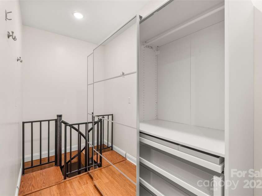 3009 Brooks Mill Lane, Wingate, NC 28174.  MLS# CAR4293288, YatesRealty ID 15104. Convenience closet with an organizer and stairs that lead to your huge dressing room. 