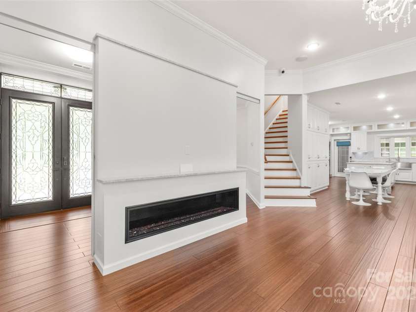 3009 Brooks Mill Lane, Wingate, NC 28174.  MLS# CAR4293288, YatesRealty ID 15104. Lovely gas fireplace with decorative glass stones and multi colored lighting options adds ambience to any occasion