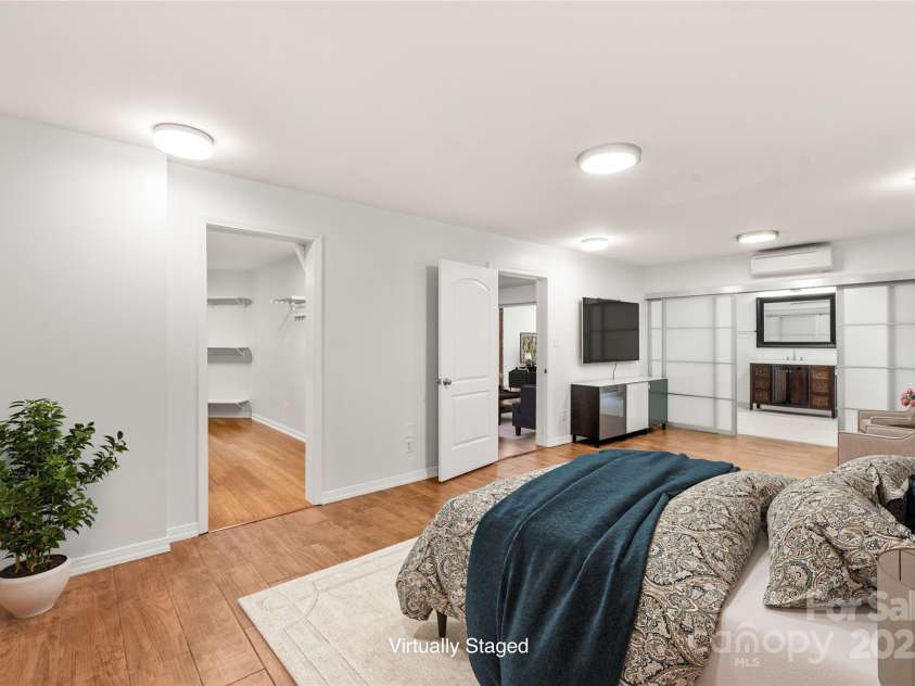 3009 Brooks Mill Lane, Wingate, NC 28174.  MLS# CAR4293288, YatesRealty ID 15104. Spacious guestroom with an ensuite bath and huge walk-in closet