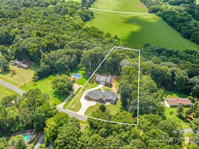 3009 Brooks Mill Lane, Wingate, NC 28174.  MLS# CAR4293288, YatesRealty ID 15104. What would it be like if all this were yours? Don't wait, it can be.