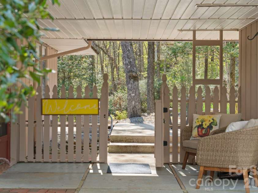 363 Sequoyah Lane, Brevard, NC 28712.  MLS# CAR4370995, YatesRealty ID 15106. Shall we make our way to the back yard?