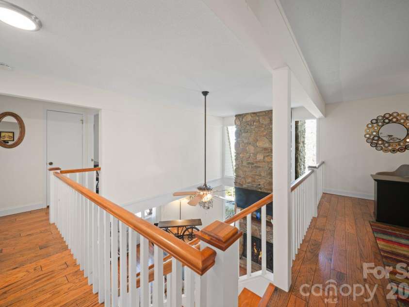 363 Sequoyah Lane, Brevard, NC 28712.  MLS# CAR4370995, YatesRealty ID 15106. Upstairs is open to the main level