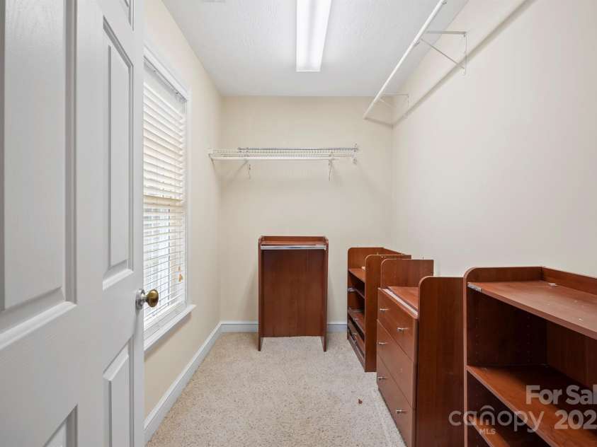 119 Heritage Creek Drive, Hickory, NC 28601.  MLS# CAR4209146, YatesRealty ID 1511. Master closet (shelving moved for new paint)