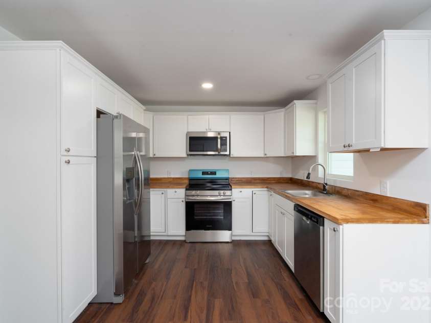 1411 Caldwell Street, Gastonia, NC 28052.  MLS# CAR4253816, YatesRealty ID 15117. 