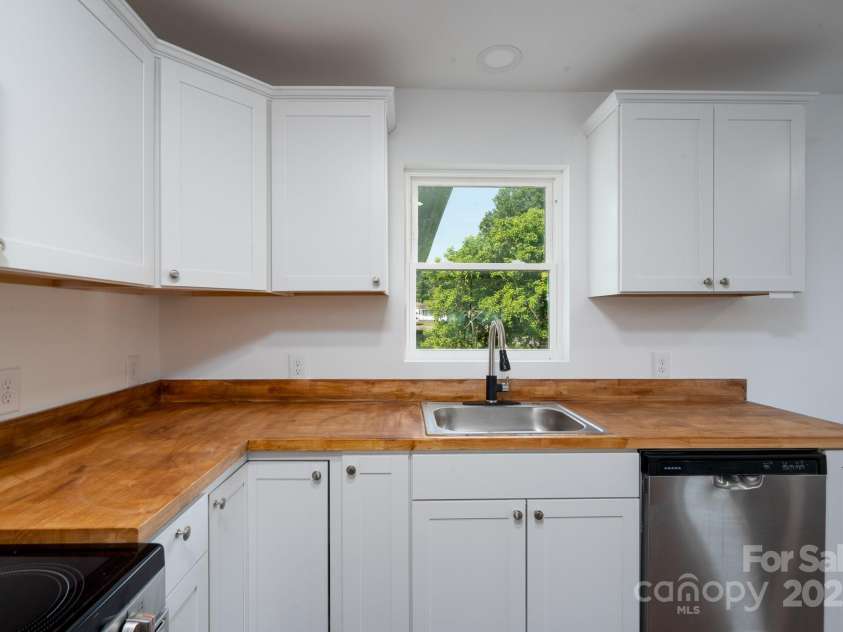 1411 Caldwell Street, Gastonia, NC 28052.  MLS# CAR4253816, YatesRealty ID 15117. 