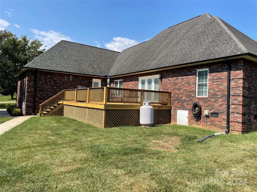 115 Anson Drive, China Grove, NC 28023.  MLS# CAR4146594, YatesRealty ID 1512. Large deck for outdoor living and entertaining