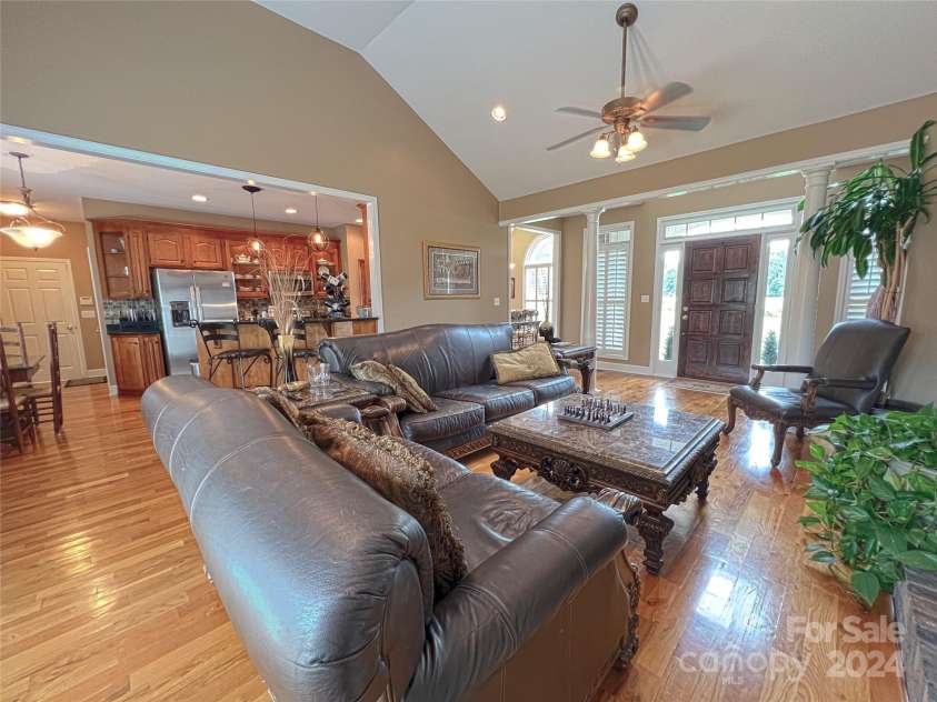 115 Anson Drive, China Grove, NC 28023.  MLS# CAR4146594, YatesRealty ID 1512. This design of open space for kitchen, breakfast nook and family room is amazing - allows the most comfortable seating and accessories anyone can imagine or wish for.