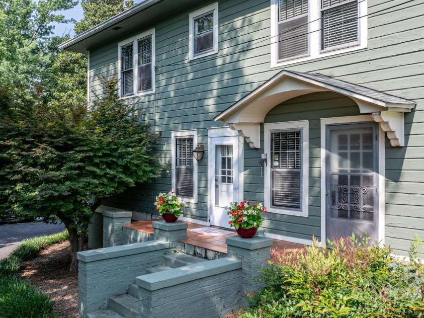 313 Main Street, Morganton, NC 28655.  MLS# CAR4275502, YatesRealty ID 1512. Side porch leading to driveway and detached garage.