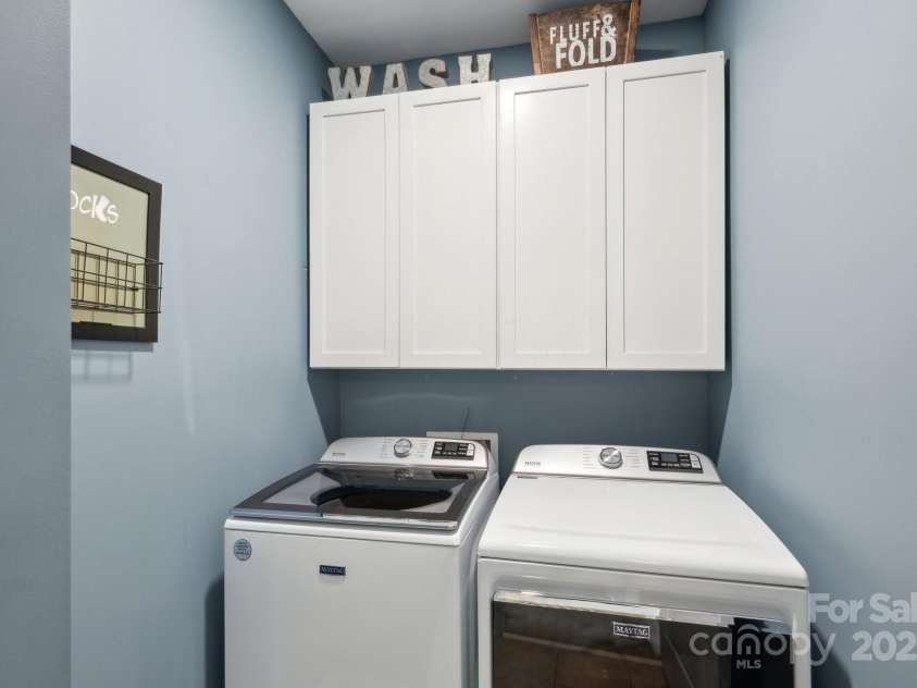 4430 Bravery Place, Concord, NC 28027.  MLS# CAR4260859, YatesRealty ID 15120. Built in cabinets on second floor laundry.
