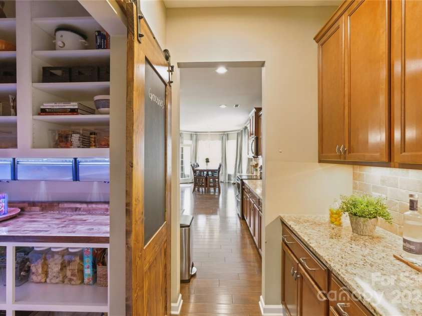 4430 Bravery Place, Concord, NC 28027.  MLS# CAR4260859, YatesRealty ID 15120. Butler's Pantry from formal dining to kitchen.