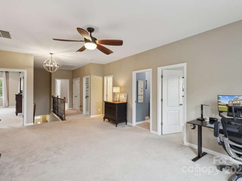 4430 Bravery Place, Concord, NC 28027.  MLS# CAR4260859, YatesRealty ID 15120. Loft is great for game nights, media room, or additional lounge space.