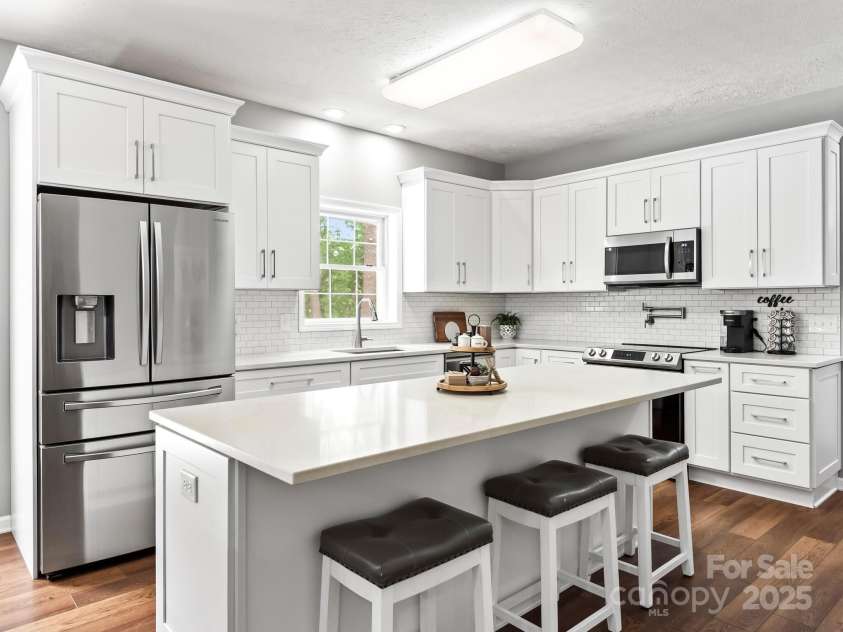 642 Bull Creek Road, Mars Hill, NC 28754.  MLS# CAR4260384, YatesRealty ID 15122. Don’t you just love this kitchen updated with new cabinets,island, and appliances 3 years ago