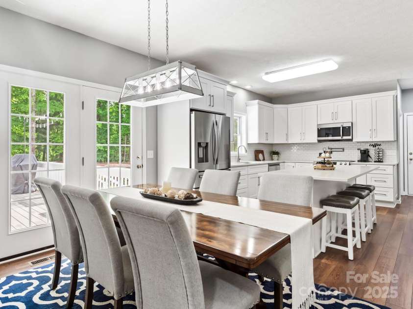 642 Bull Creek Road, Mars Hill, NC 28754.  MLS# CAR4260384, YatesRealty ID 15122. Looking at this beautiful kitchen from hallway at opening to the living room