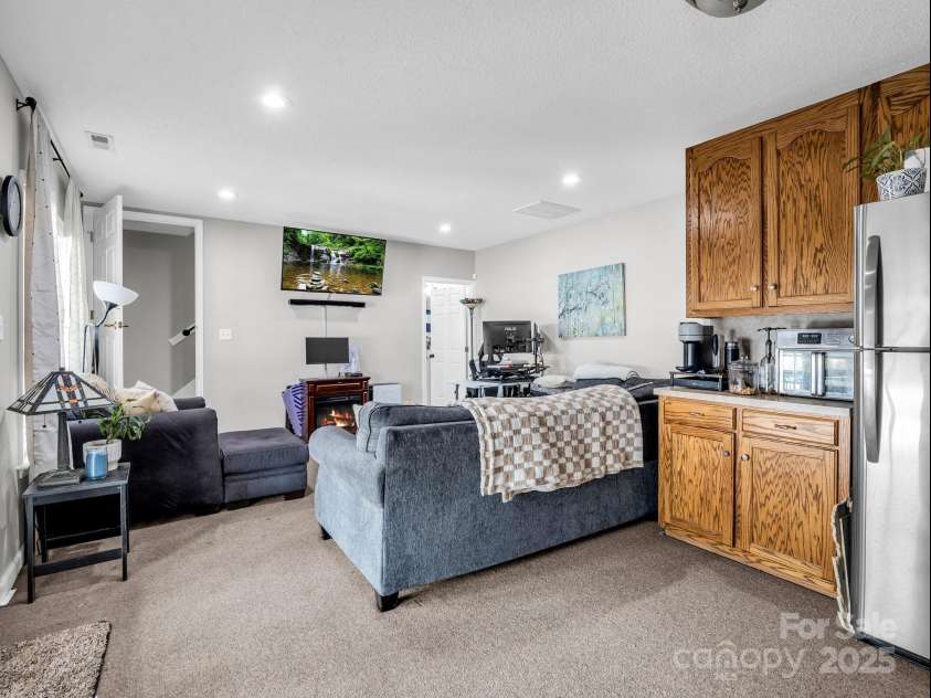 208 Wellington Drive, Lincolnton, NC 28092.  MLS# CAR4252739, YatesRealty ID 15128. Living area - kitchenette in basement