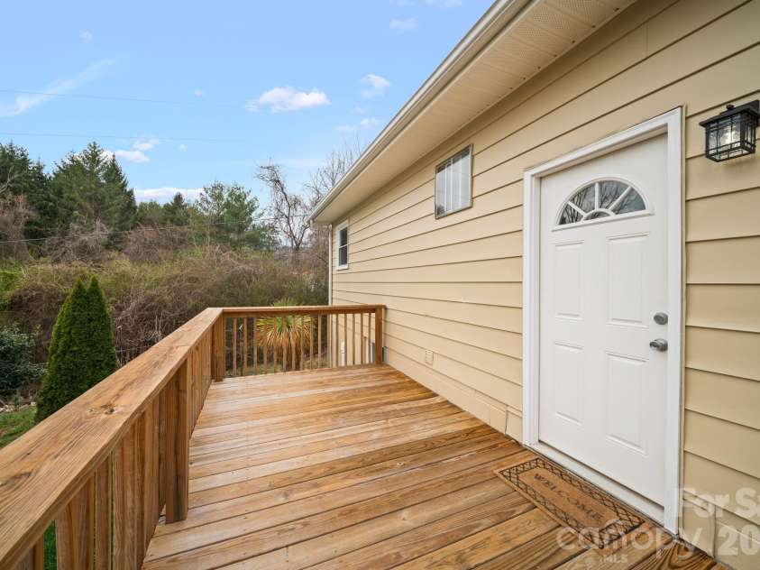 26 Cedar Hill Road, Asheville, NC 28806.  MLS# CAR4357706, YatesRealty ID 15128. Exspansive back deck.