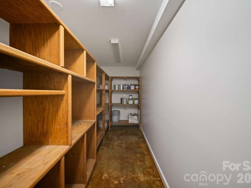 26 Cedar Hill Road, Asheville, NC 28806.  MLS# CAR4357706, YatesRealty ID 15128. Lower Level additional storage off living room.