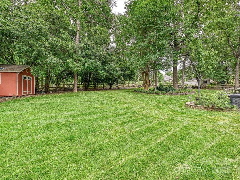 2911 Butter Churn Lane, Matthews, NC 28105.  MLS# CAR4260813, YatesRealty ID 15130. 