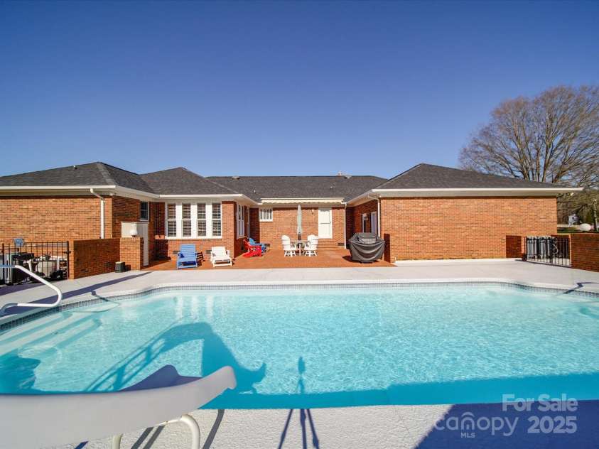 7169 Pleasant Grove Road, Charlotte, NC 28216.  MLS# CAR4214208, YatesRealty ID 15135. 5 ft deep heated pool