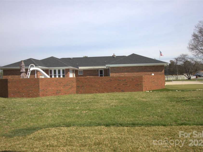 7169 Pleasant Grove Road, Charlotte, NC 28216.  MLS# CAR4214208, YatesRealty ID 15135. 