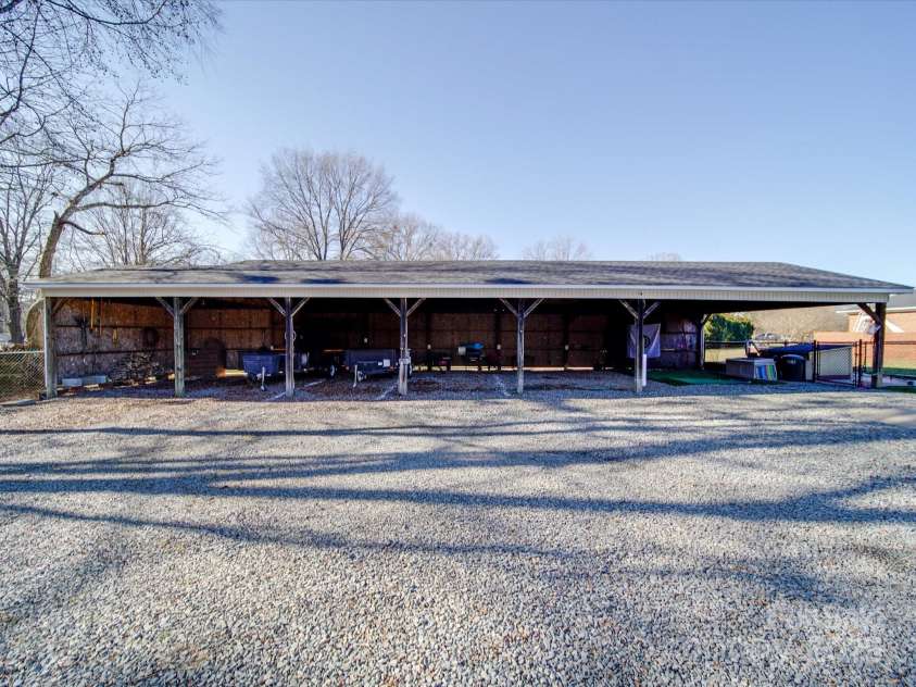 7169 Pleasant Grove Road, Charlotte, NC 28216.  MLS# CAR4214208, YatesRealty ID 15135. 7 bay pole barn