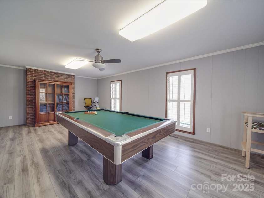 7169 Pleasant Grove Road, Charlotte, NC 28216.  MLS# CAR4214208, YatesRealty ID 15135. Game room. Pool table included.