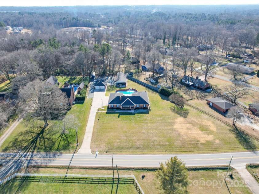7169 Pleasant Grove Road, Charlotte, NC 28216.  MLS# CAR4214208, YatesRealty ID 15135. Large lot and no HOA dues