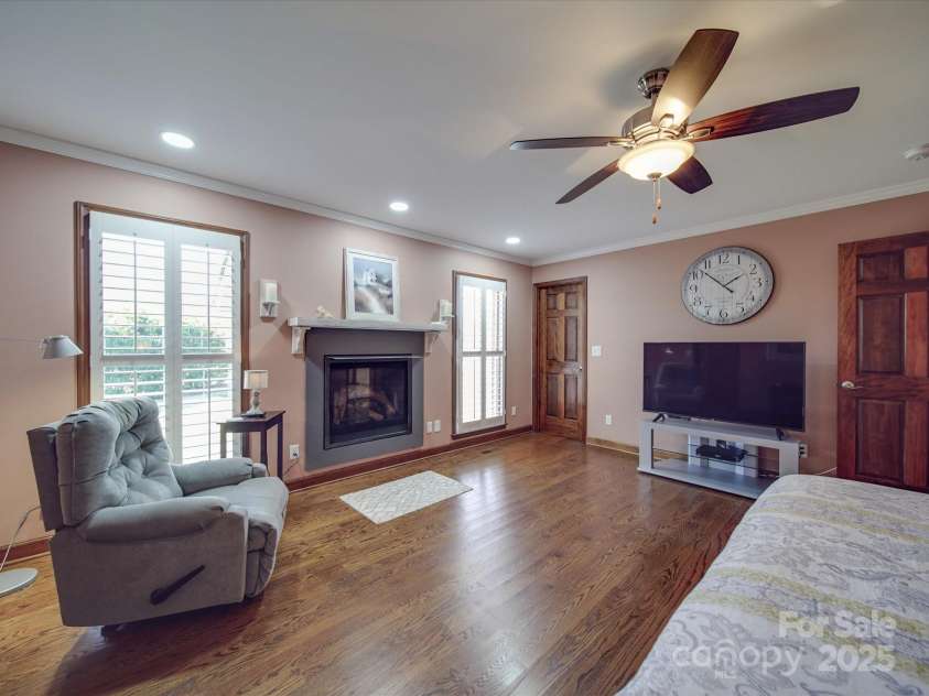 7169 Pleasant Grove Road, Charlotte, NC 28216.  MLS# CAR4214208, YatesRealty ID 15135. Primary Bedroom w/ gas logs