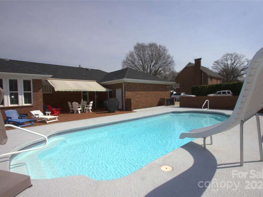 7169 Pleasant Grove Road, Charlotte, NC 28216.  MLS# CAR4214208, YatesRealty ID 15135. Retractable Awning