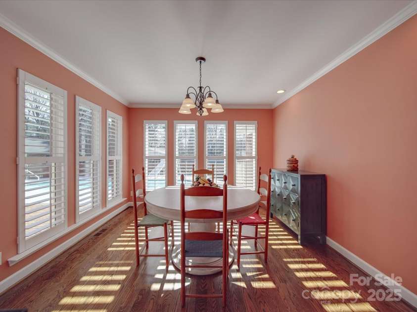 7169 Pleasant Grove Road, Charlotte, NC 28216.  MLS# CAR4214208, YatesRealty ID 15135. Sunroom/dining room