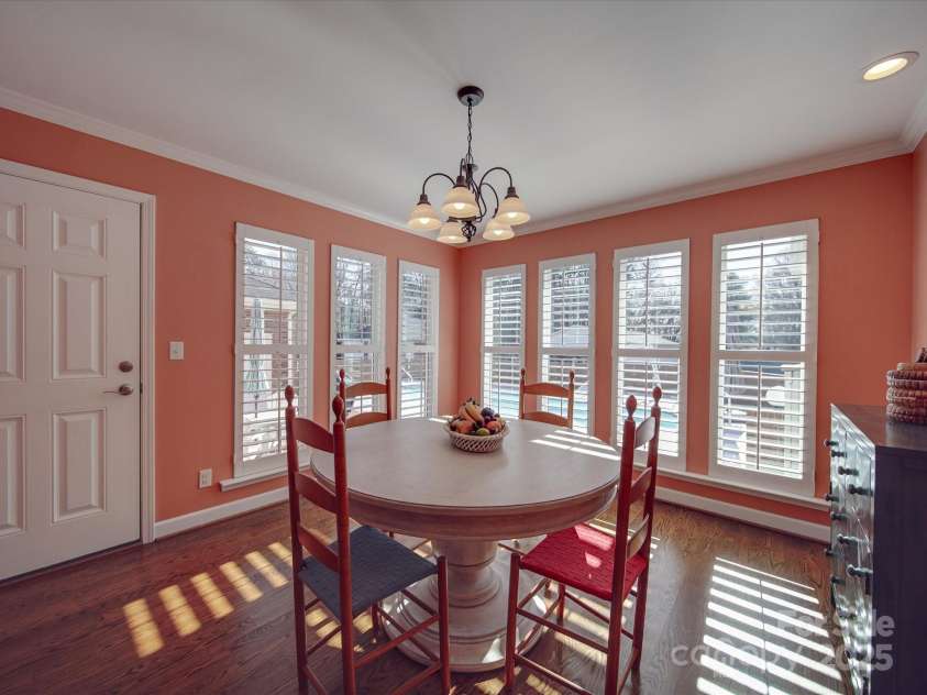 7169 Pleasant Grove Road, Charlotte, NC 28216.  MLS# CAR4214208, YatesRealty ID 15135. Sunroom/dining room