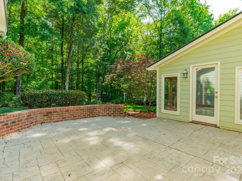 5232 Silchester Lane, Charlotte, NC 28215.  MLS# CAR4240756, YatesRealty ID 15138. Backyard Patio off Sunroom