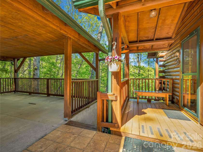 212 Glen Echo Circle, Saluda, NC 28773.  MLS# CAR4369603, YatesRealty ID 15139. Attached carport