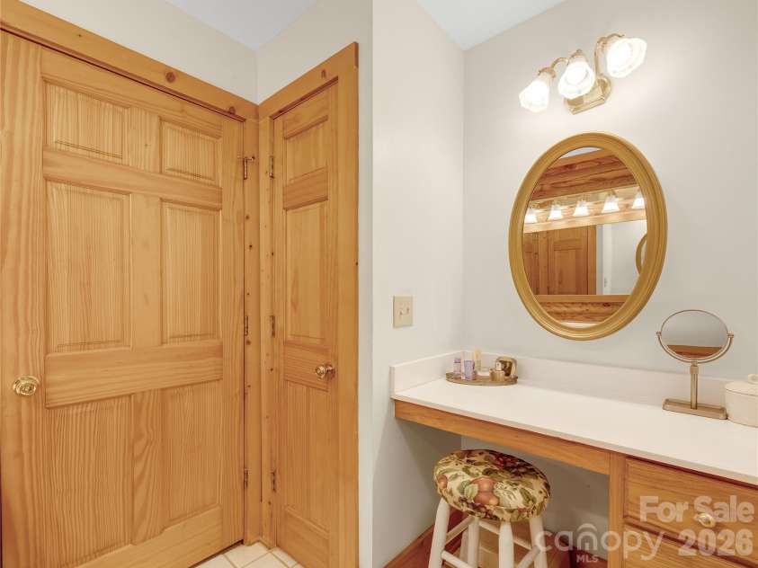 212 Glen Echo Circle, Saluda, NC 28773.  MLS# CAR4369603, YatesRealty ID 15139. Dressing area in primary bathroom