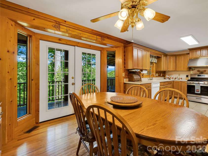 212 Glen Echo Circle, Saluda, NC 28773.  MLS# CAR4369603, YatesRealty ID 15139. French doors to private covered deck