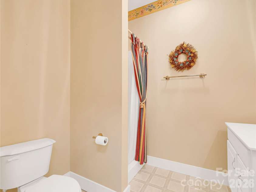 212 Glen Echo Circle, Saluda, NC 28773.  MLS# CAR4369603, YatesRealty ID 15139. Full bath downstairs