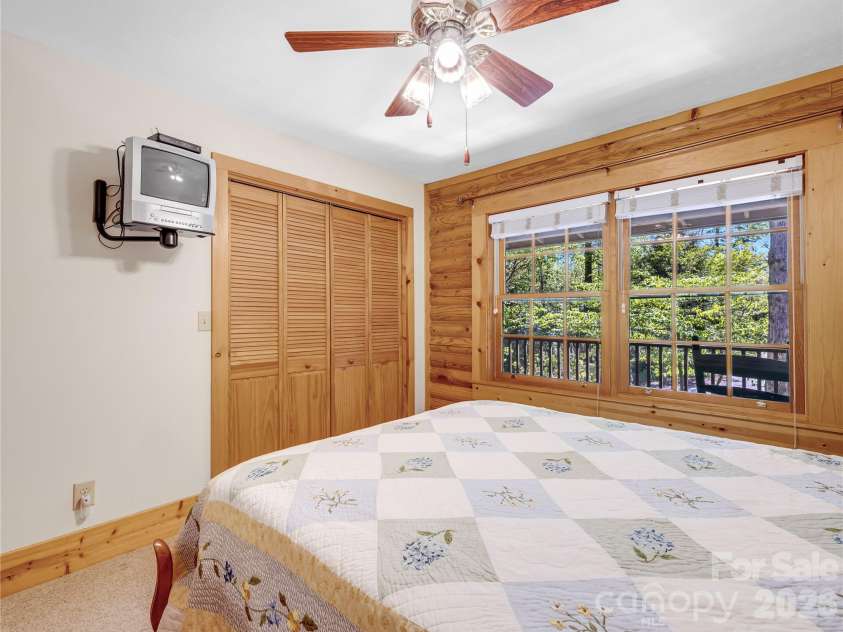 212 Glen Echo Circle, Saluda, NC 28773.  MLS# CAR4369603, YatesRealty ID 15139. Guest bedroom with closet