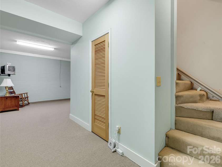 212 Glen Echo Circle, Saluda, NC 28773.  MLS# CAR4369603, YatesRealty ID 15139. Interior access to full basement