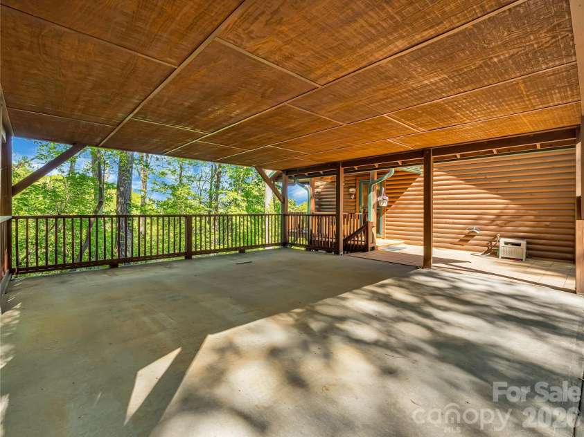 212 Glen Echo Circle, Saluda, NC 28773.  MLS# CAR4369603, YatesRealty ID 15139. Large two car carport