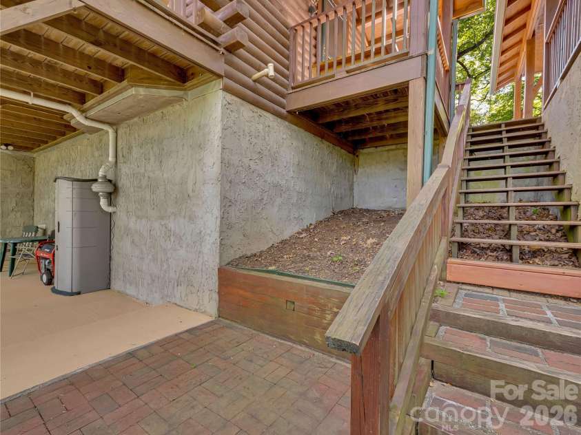 212 Glen Echo Circle, Saluda, NC 28773.  MLS# CAR4369603, YatesRealty ID 15139. Outside entrance to lower level